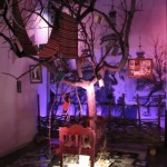 A dead apple tree through a crib symbolize the lost generation. Chernobyl Museum.