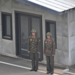 Soldiers standing guard at the DMZ, in North Korea.