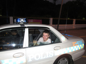 In the back of a Malaysian police car. Drama added for effect.