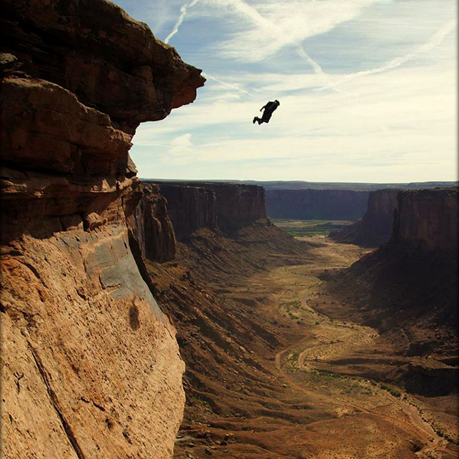 Mitch Potter jumping at Moab desert. 